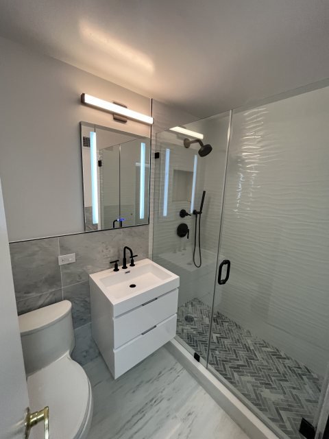 Bathrooms remodel by A&A Construction