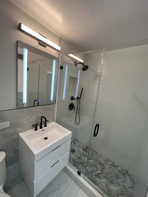 Bathrooms remodel by A&A Construction