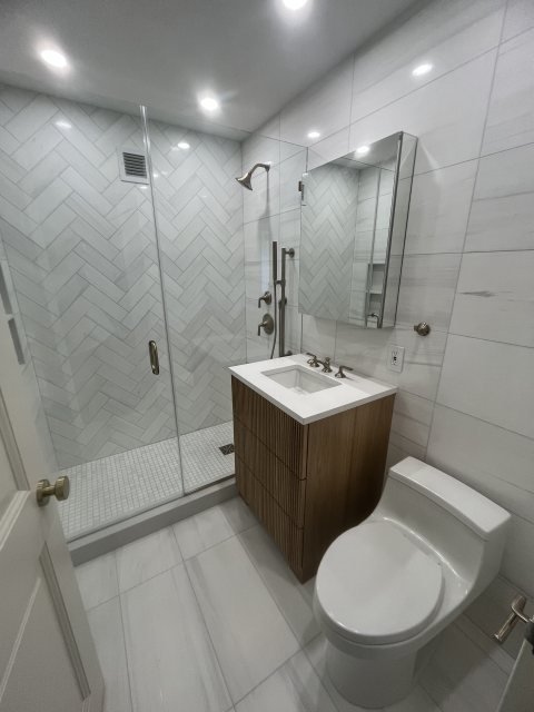 Bathrooms remodel by A&A Construction